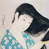 Kvinde reder sit hår, 1920